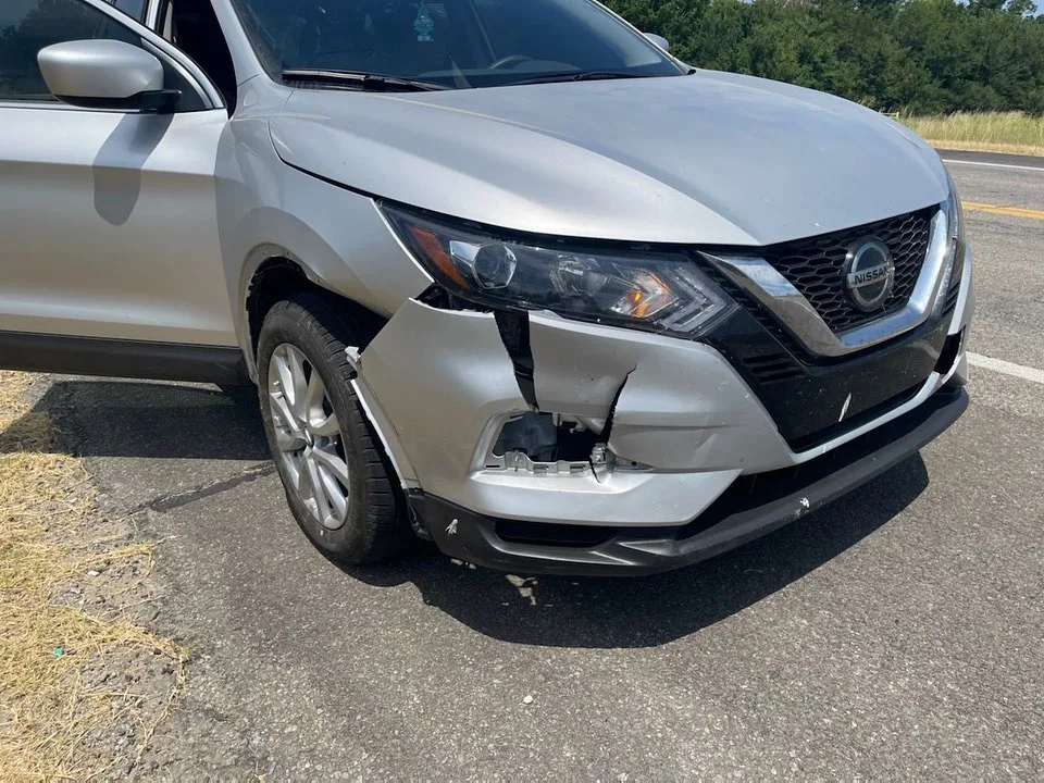 Before: vehicle with front bumper damage