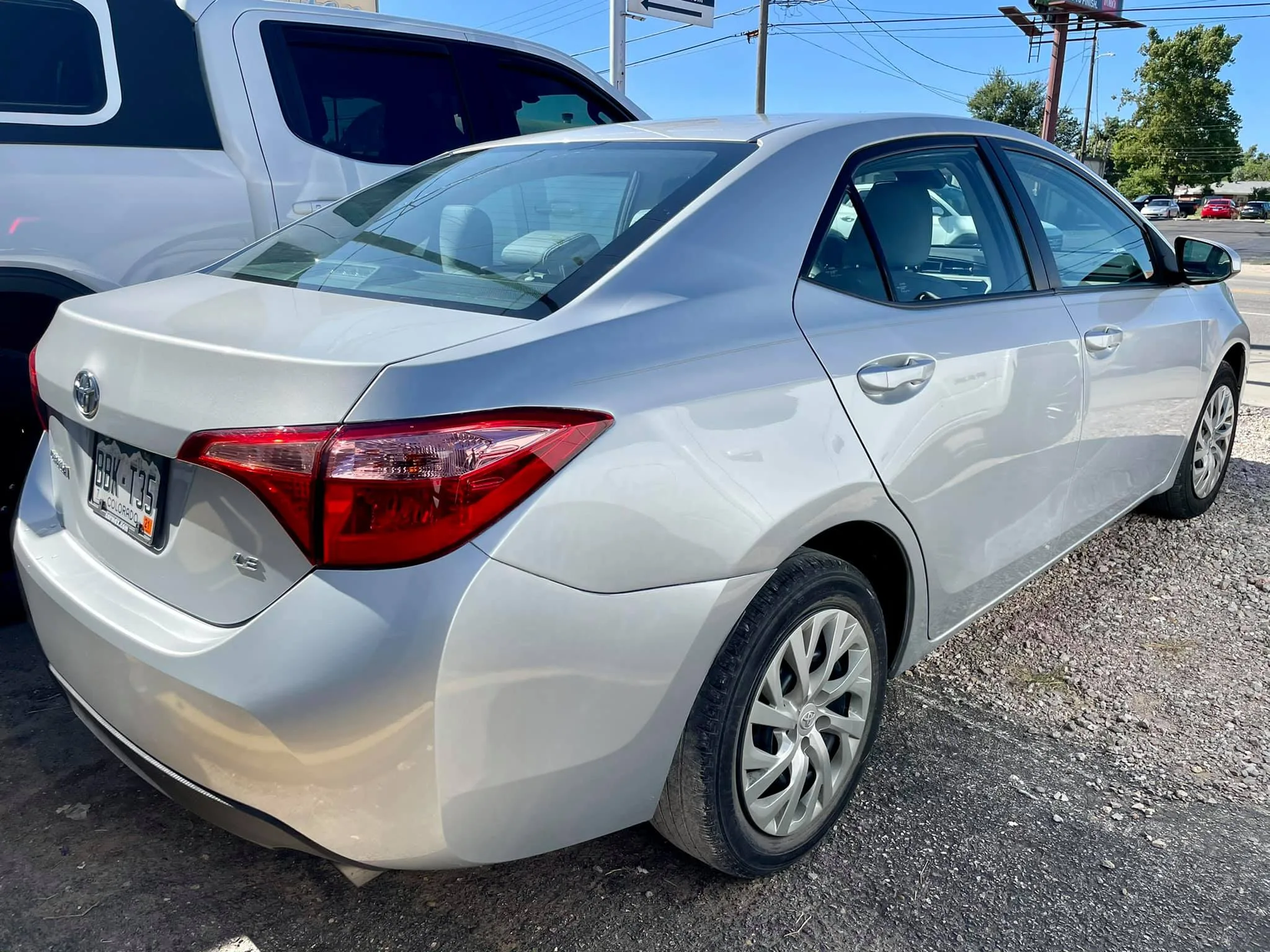 After: sedan repaired and refinished